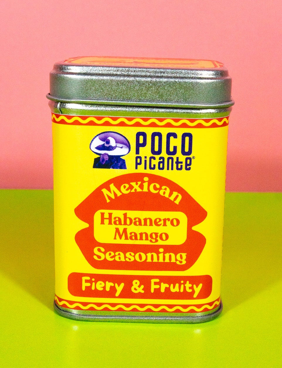 Poco Picante Mexican Habanero Mango Seasoning can on a pink and green background